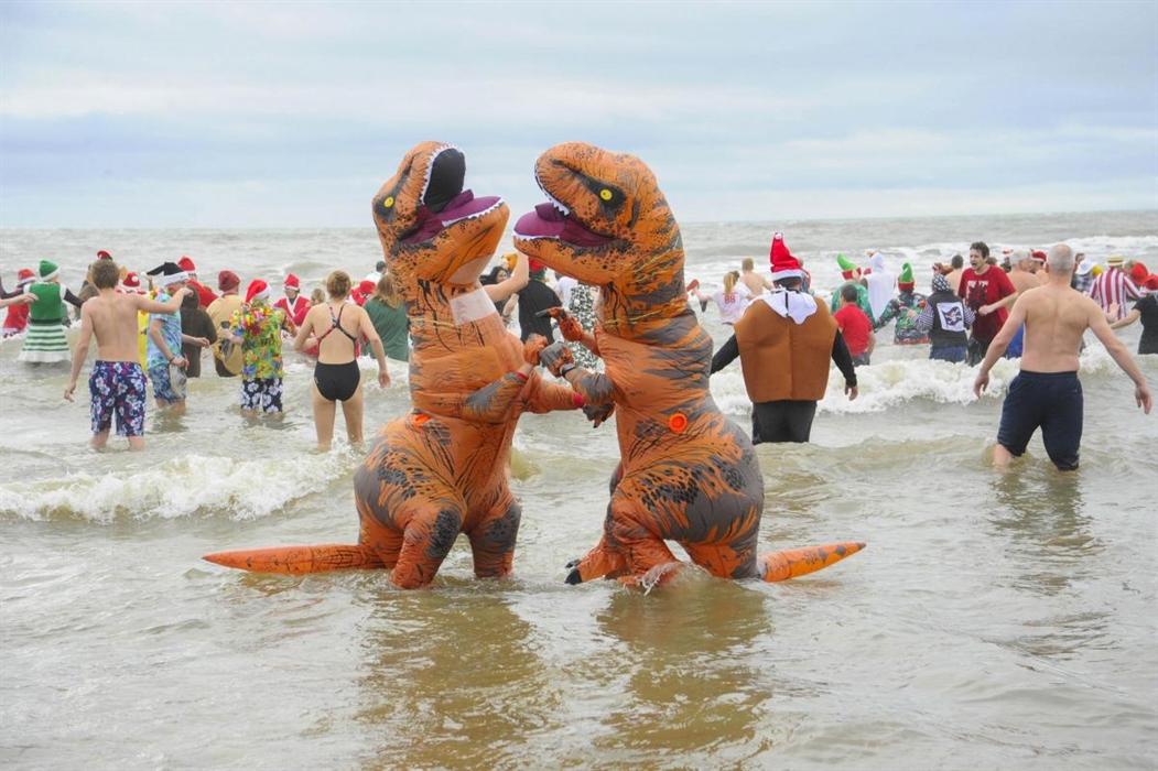 Seaside On Christmas Parade 2022 Annual Christmas Day Fancy Dress Swim At Charmouth Beach - Visit Dorset